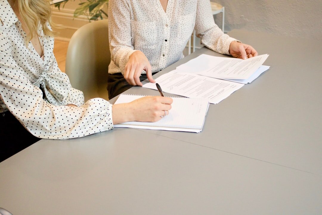 person signing insurance document