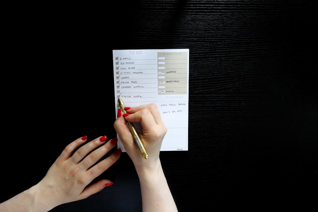 Person reading through the fine print of a financial agreement before signing