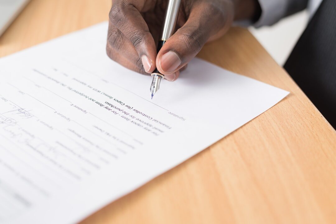 person signing insurance contract